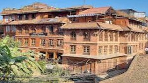 A traditional multi-story building with a wooden facade and multiple windows. - MeroStay 149 HE (Bhaktapur)