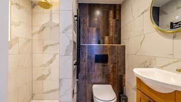 Bathtub, hair dryer, towels