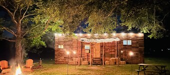 Cabin 2 near the river nestled next to Sam Houston Park with a fire pit