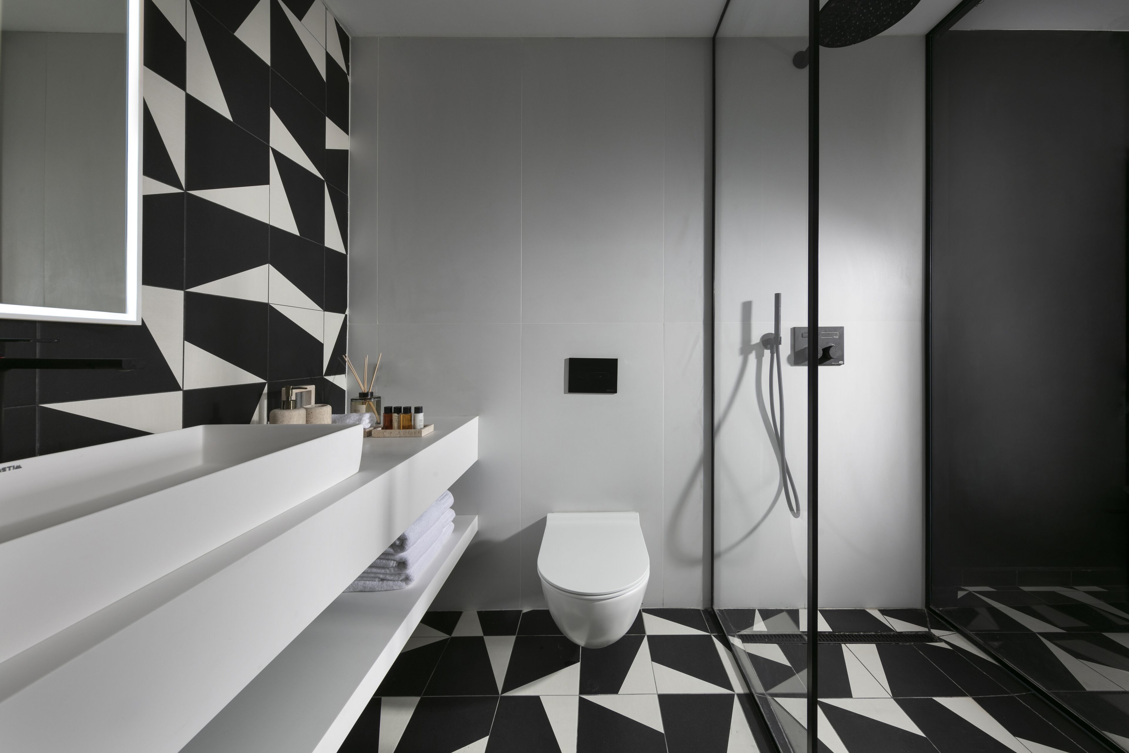 Shower, rainfall showerhead, towels, soap