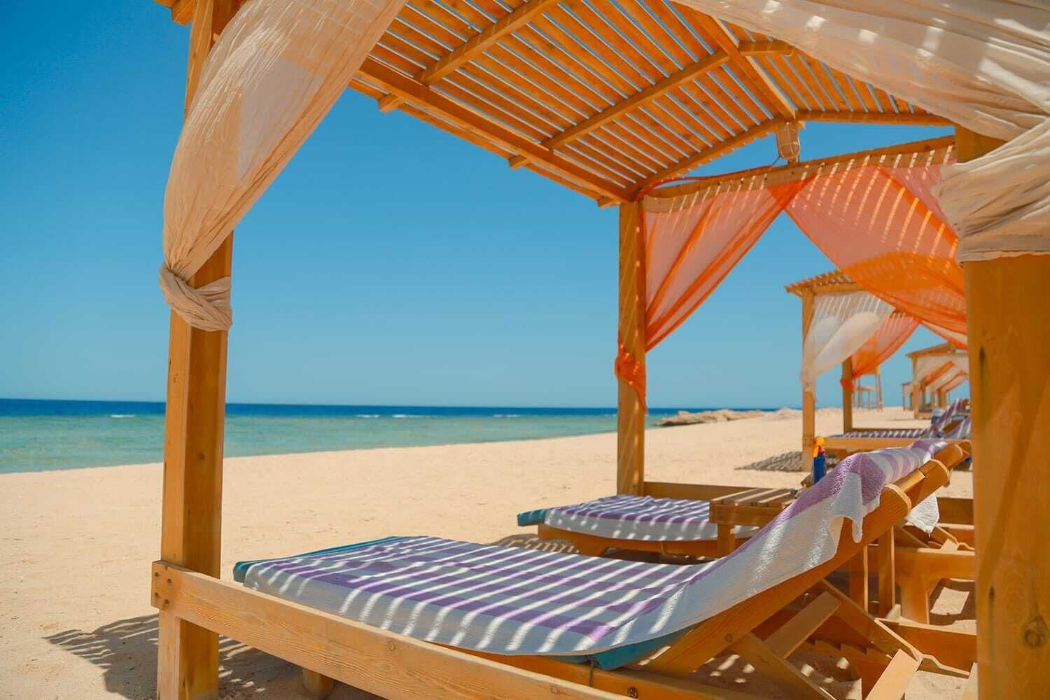 Private beach, white sand, sun-loungers, beach umbrellas