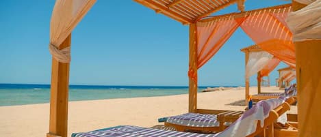 Private beach, white sand, sun-loungers, beach umbrellas