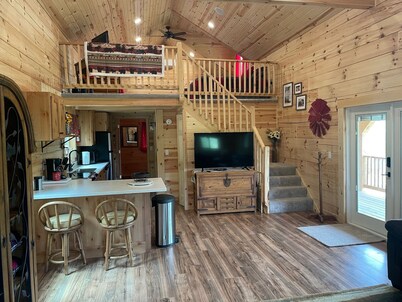 Cozy hillside retreat near trout stream, public forest and UTV trails.