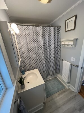 Hair dryer, towels, soap, shampoo