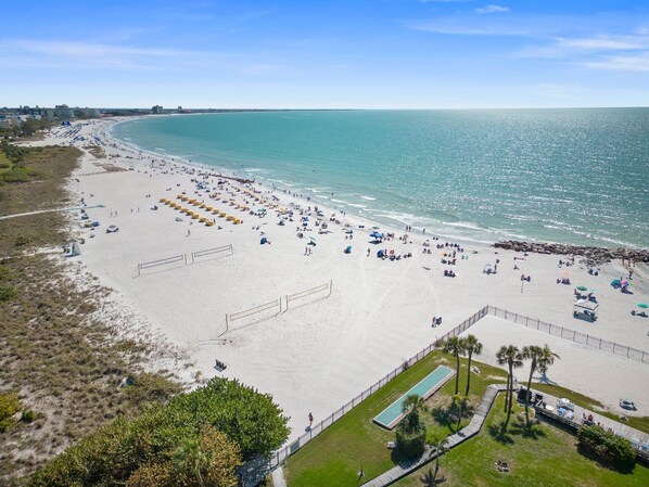 On the beach, sun loungers, beach towels