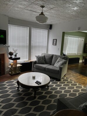 Living area - Entire vintage 1920 1st floor apartment, walking distance to Soo Locks! (Sault Ste. Marie)