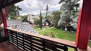 Deluxe Suite, Patio, Garden View | Terrace/patio