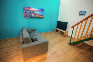 Deluxe-Vierbettzimmer | Fernseher