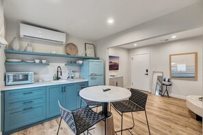 Fridge, coffee/tea maker, toaster, cookware/dishes/utensils