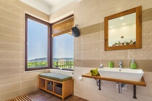 Shower, jetted bath, eco-friendly toiletries, hair dryer