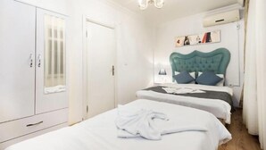 Familie appartement, meerdere bedden, keuken, uitzicht op stad
