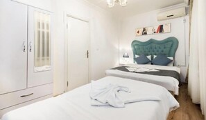 Appartement Familial, plusieurs lits, cuisine, vue ville | Rideaux occultants, fer et planche à repasser, Wi-Fi gratuit