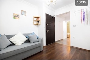 Appartement Familial, plusieurs lits, cuisine, vue ville | Coin séjour