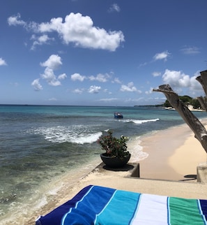 On the beach, sun loungers, beach towels