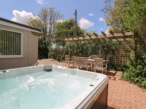 Bañera de hidromasaje al aire libre