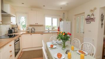 Fridge, electric kettle, toaster, cookware/dishes/utensils