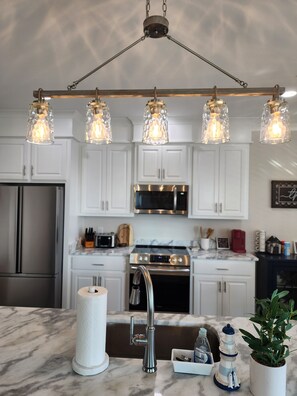 Microonde, forno, piano cottura, lavastoviglie