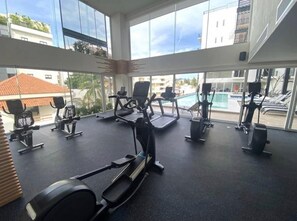 A gym with treadmills, stationary bikes, and rowing machines. - Across the street from Ocean! Unique Mexican Condo (Bucerías)