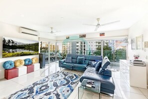 Luxury Apartment | Living area | Flat-screen TV - ZEN TREE BLOSSOM - 3BR Luxury Apartment (Darwin)