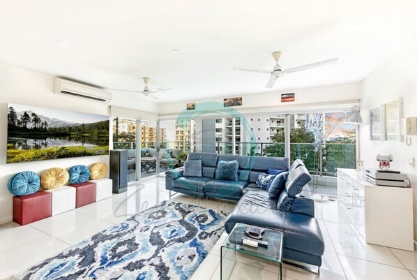 Luxury Apartment | Living area | Flat-screen TV