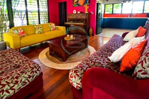 Exclusive House | Living area | 50-inch flat-screen TV with cable channels, TV, Netflix - ZENHOUSE NIGHTCLIFF - 6BR Tropical Oasis (Nightcliff)