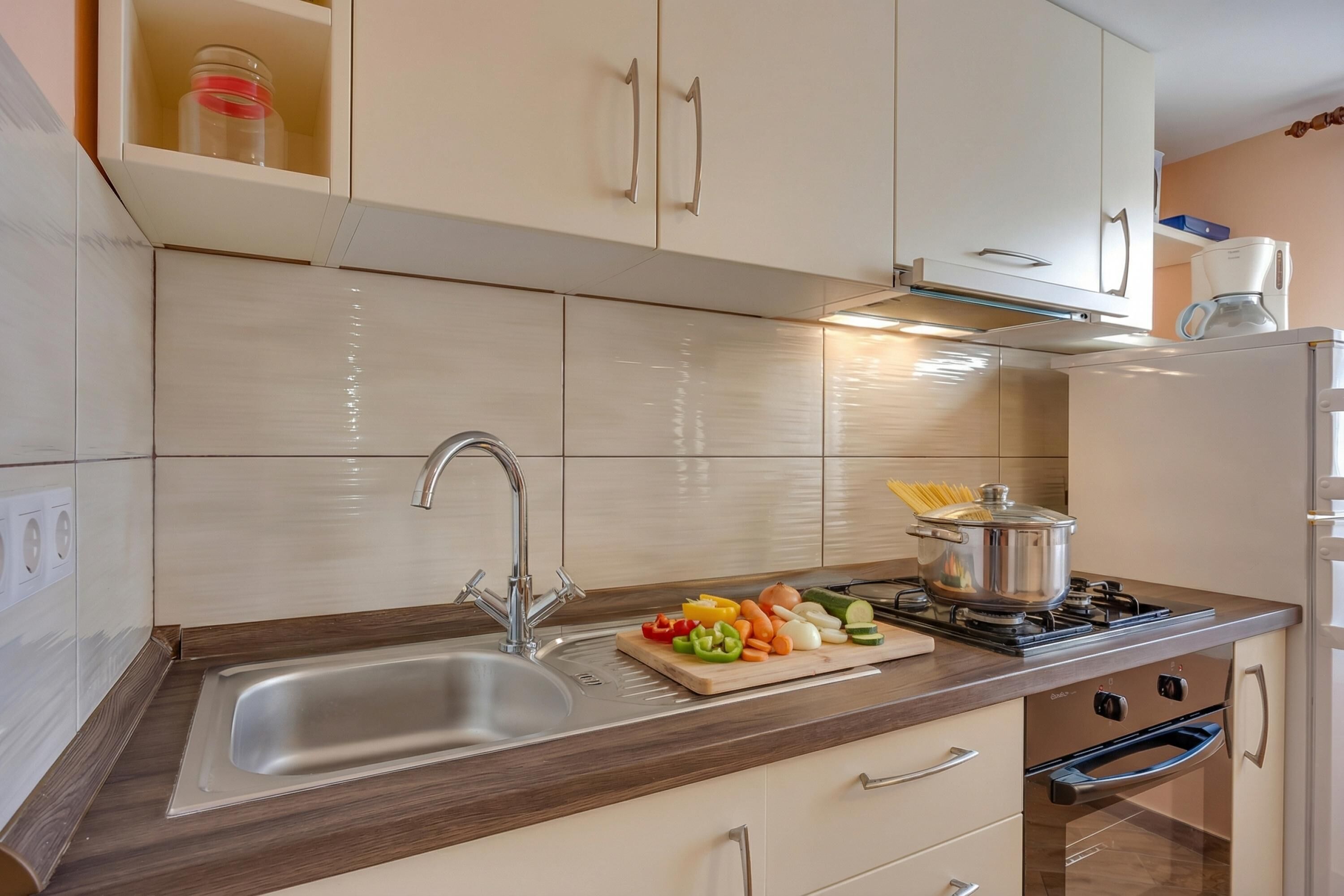 Family House, Multiple Bedrooms (Holiday Home Ema) | Private kitchen | Fridge, microwave, oven, stovetop