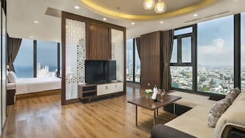 Deluxe Double Room, 1 King Bed, Beach View | Living area | 43-inch LED TV with digital channels, TV