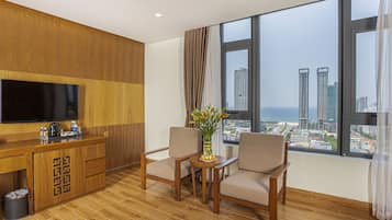 Deluxe Double Room, 1 King Bed, Beach View | Living area | 43-inch LED TV with digital channels, TV