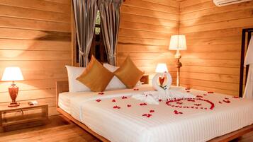 Honeymoon Bungalow, 1 Bedroom, Private Pool | Free minibar items, in-room safe, individually decorated, desk
