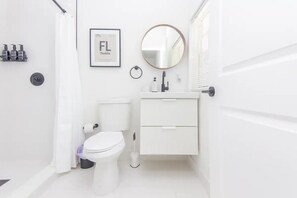 Hair dryer, towels, soap, toilet paper