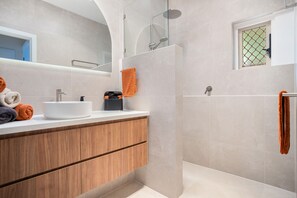 Shower, hair dryer, towels, soap