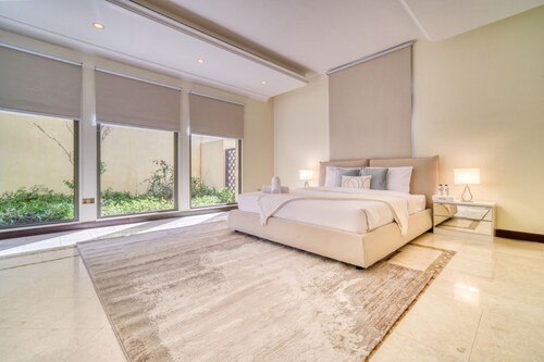 Premier 6BR Villa with Assistant's Room and Private Pool in Frond E Palm Jumeirah by Deluxe Holiday Homes
