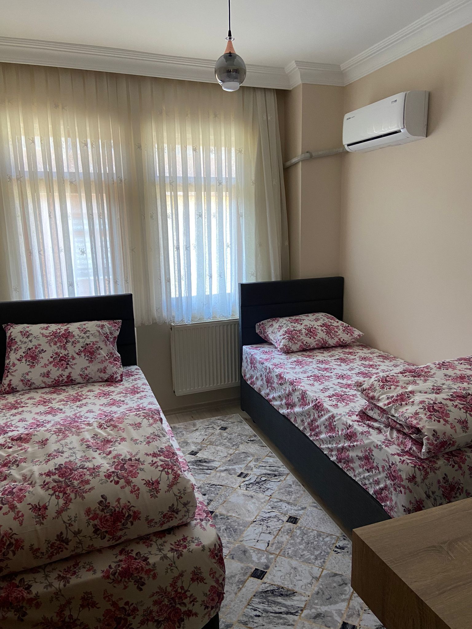 hypo-allergenic bedding, desk, laptop workspace, blackout curtains