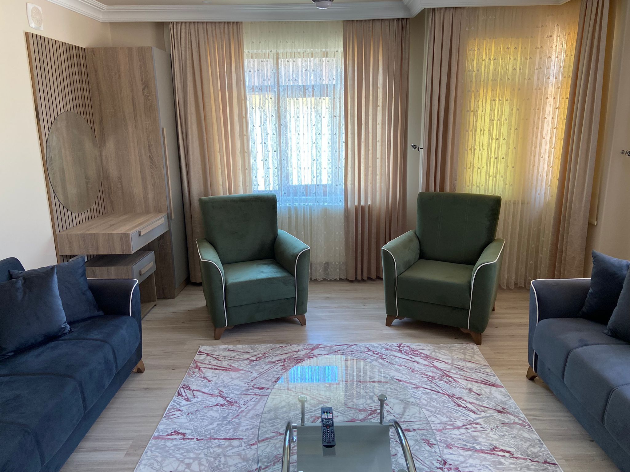 comfort apartment | living area | lcd tv