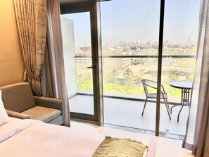 Apartment (0 Bedroom) | Iron/ironing board, bed sheets - Stunning New Studio With Balcony in Park View JVC (Dubai)