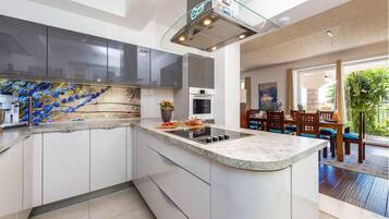 Villa, Multiple Beds | Private kitchen | Fridge, microwave, oven, stovetop