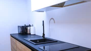Suíte estúdio família | Cozinha privada | Geladeira grande, micro-ondas, cooktop, lava-louças
