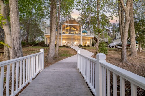 Lake Gaston waterfront home!  Our guests love using our free pontoon boat !