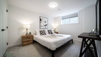 1 bedroom, desk, iron/ironing board, travel crib