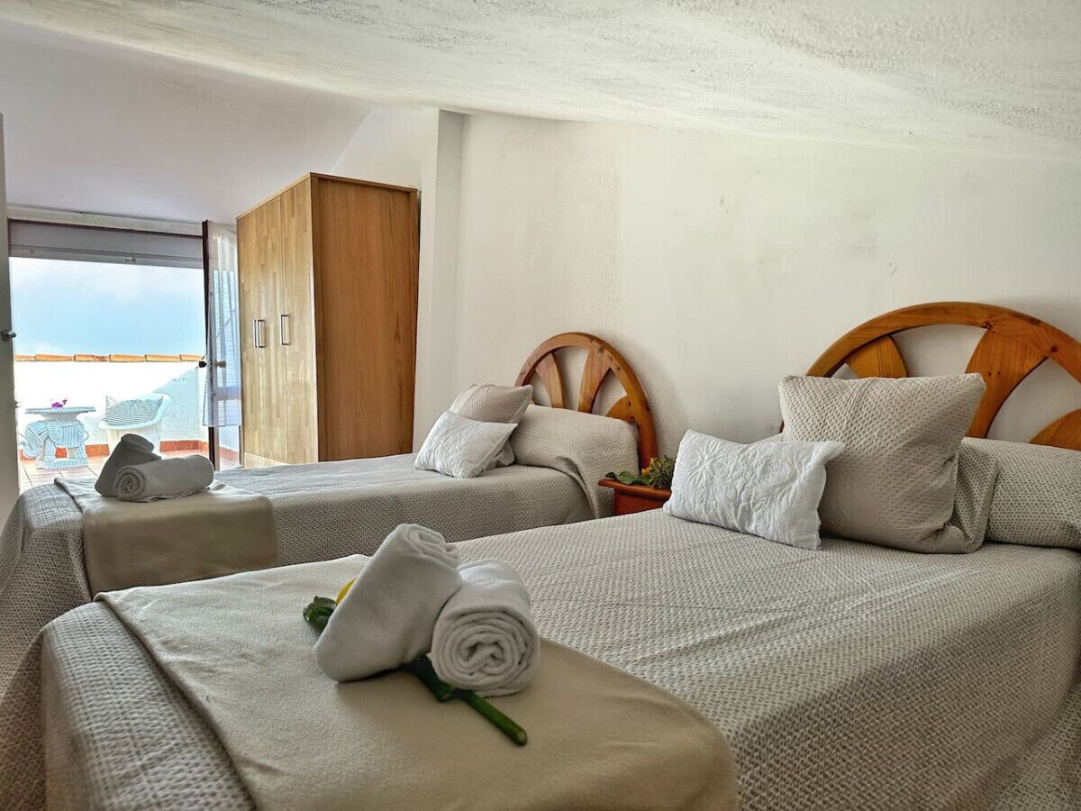 3 slaapkamers, een strijkplank/strijkijzer, beddengoed