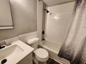 Hair dryer, towels, soap, shampoo