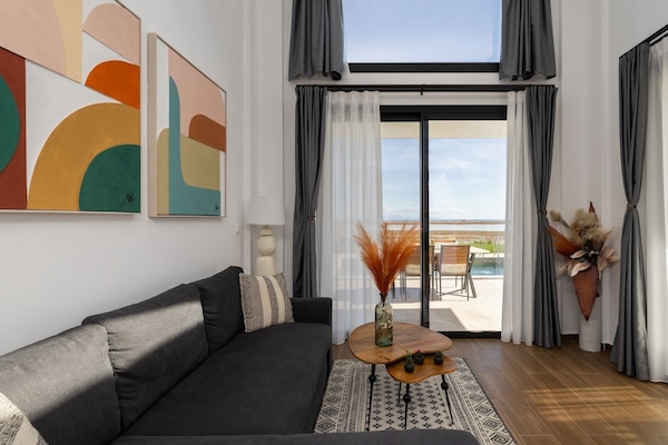 Signature Villa | Living area | Flat-screen TV