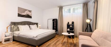 Habitación clásica | Escritorio, insonorización, wifi gratis y ropa de cama