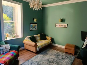 Smart TV, fireplace, books