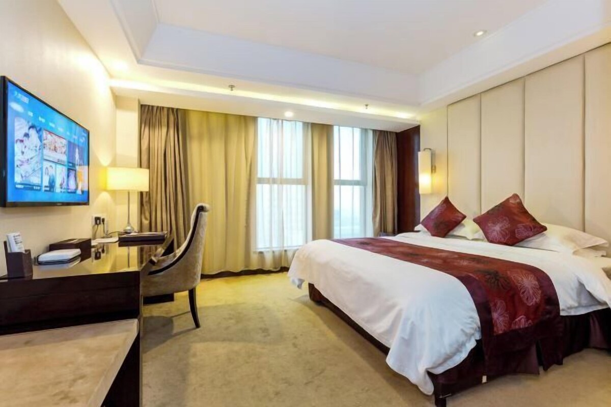 Desk, blackout curtains, iron/ironing board, bed sheets