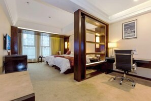 A hotel room with a large bed, a desk, a chair, a TV, and a window with curtains. - Century Yuan International hotel(Jiangyan,Taizhou) (Taizhou)
