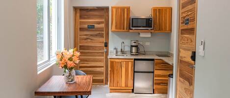 Fridge, microwave, stovetop, coffee/tea maker