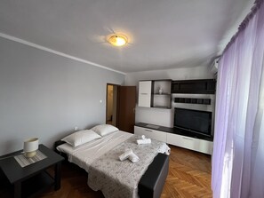 1 chambre, fer et planche à repasser, Wi-Fi, draps fournis