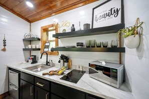 Fridge, microwave, stovetop, coffee/tea maker