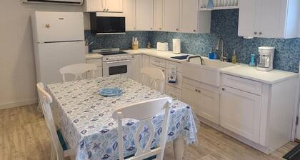 Coastal 1BR – Bayfront Views, Porch, Fishing & Walkable Lighted 1.5-Mile Seawall